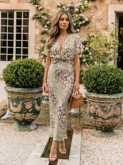 Coral | Abito midi con stampa astratta, scollo a V e vita drappeggiata