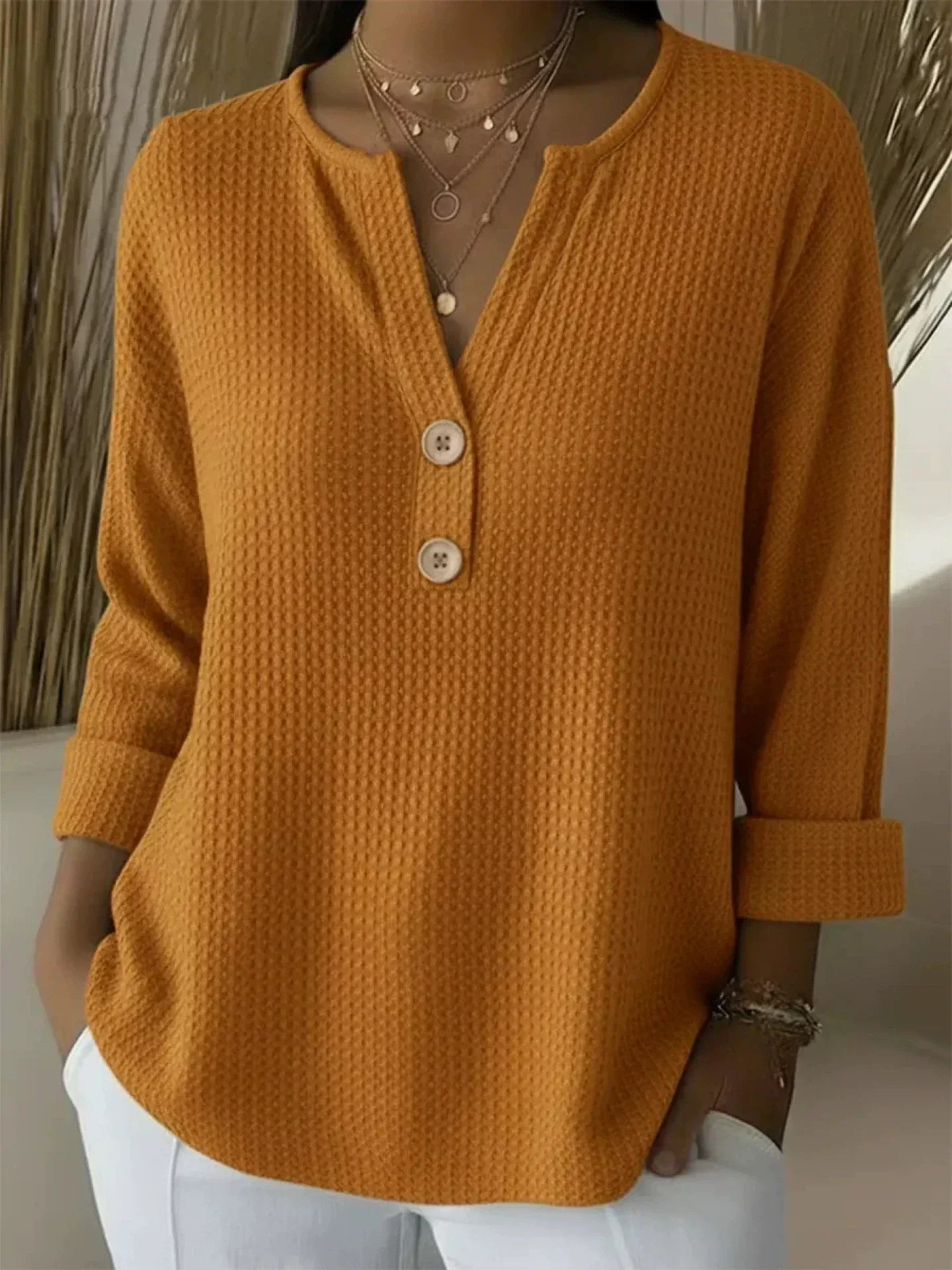 Lucía · Maglia Henley goffrata con bottoni