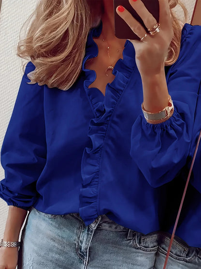 Vittoria · Blusa raffinata con balze