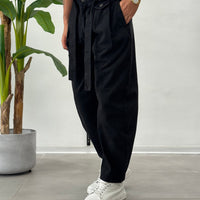Again · Jeans balloon con cintura — Colore Nero