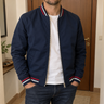 Foto condivisa dal cliente per Riviera · Bomber con bordi a righe
